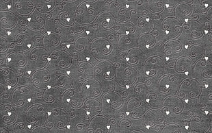 gray and white polka heart textile